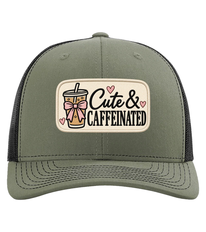 front view of Cute & Caffeinated on Loden / Black Richardson 112 Trucker Hat